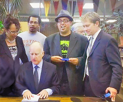Governor Brown signing LCFF into law
